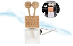 Frosted Glass Car Diffuser vent clip with wooden cap and reed sticks. 8ML frosted glass bottle for essential oils or fragrance. A passive diffuser controlled by airflow from the vent. A beautiful way to scent your space.